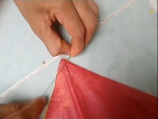 Como hacer papalote: paso 6. Atar hilo