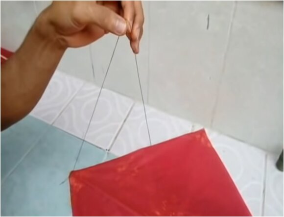 Como hacer papalote: paso 6. Equilibrar hilo