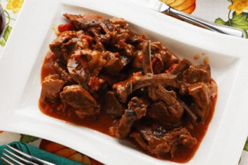 Costillas de ternera a la pizzaiola